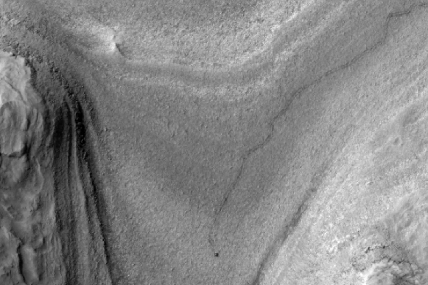 First Orbital View of Curiosity Moving Across Mars