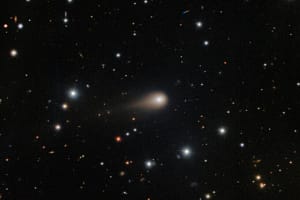 a comet streaking across a star field