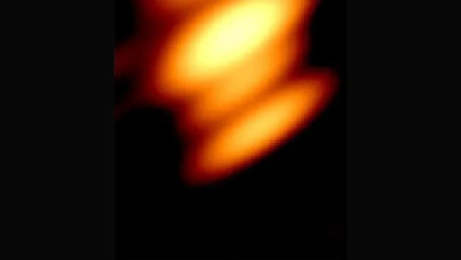 Two black holes in orbit around each other.