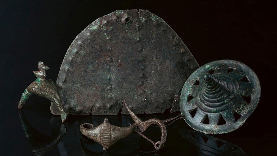 Archaeologists discover hundreds of metal objects